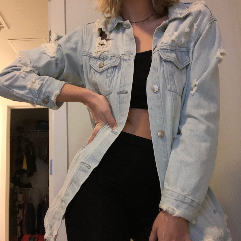 Light wash long and light jean jacket